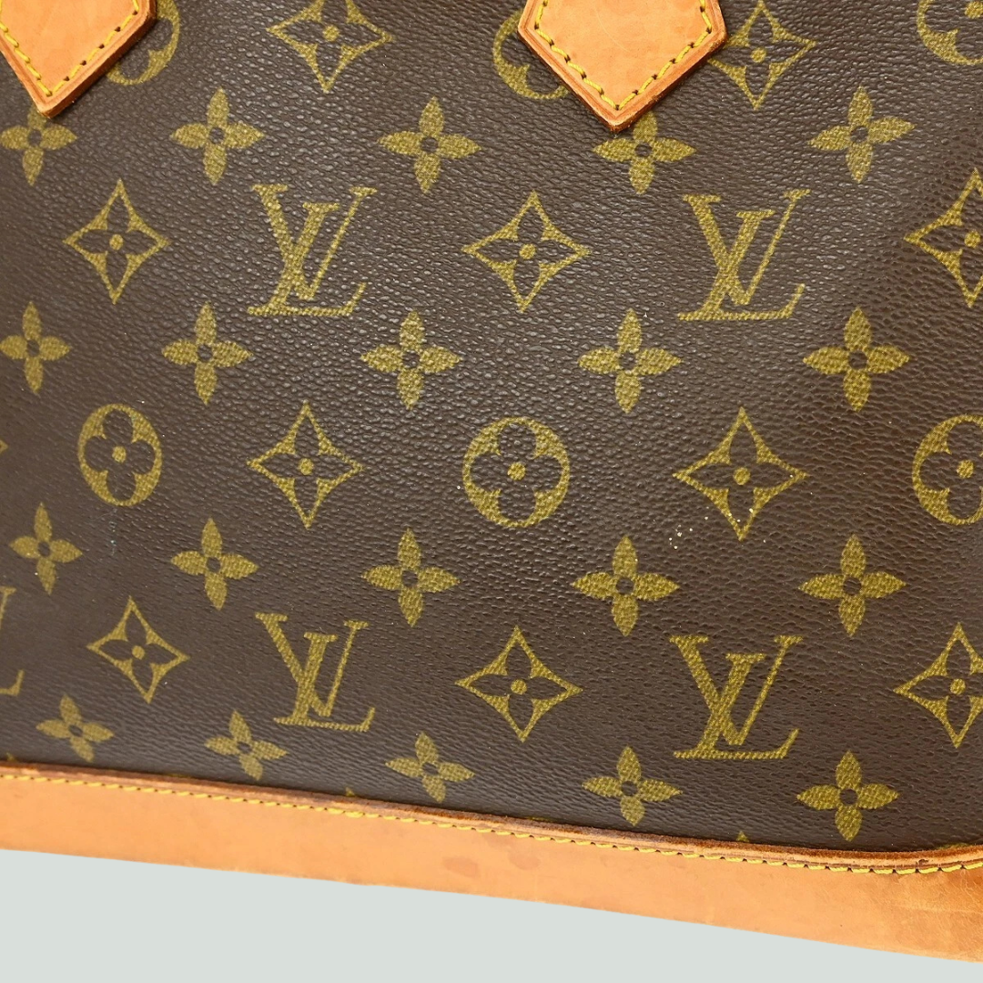 Louis Vuitton Alma Monogram Canvas Handbag