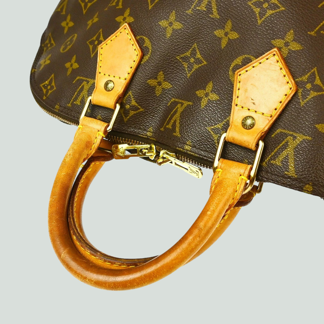 Louis Vuitton Alma Monogram Canvas Handbag