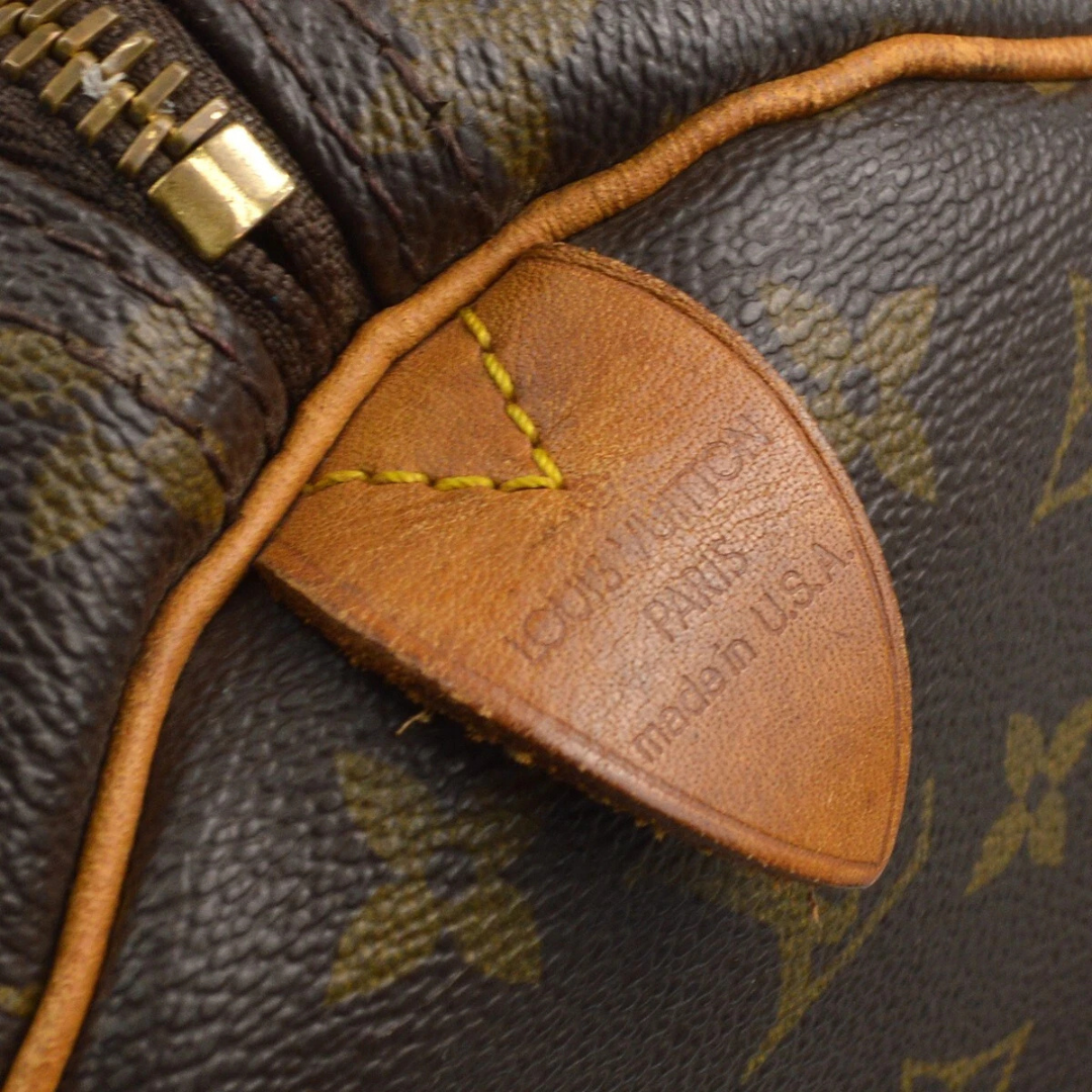 Louis Vuitton Keepall 55 Monogram Travel Bag